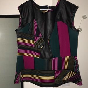 Colorful peplum top with faux leather
